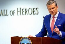 A black-and-white photograph of Pete Hegseth, U.S. Secretary of Defense. |