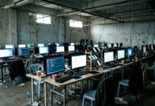 Room filled with computers and mobile phones set up for cyber scam operations