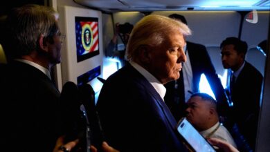 Donald Trump and Scott Bessent answering reporters’ questions aboard Air Force One about the U.S. administration’s consideration of options to intensify economic and military pressure on Iran